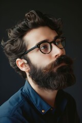 Wall Mural - A man with glasses and a beard.