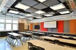 © juni studio - A modern classroom ceiling with recessed lighting and acoustic panels for better sound quality.