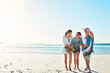 © ReeseArcurs/peopleimages.com - Grandma, daughter and happy with girl in ocean for fun on summer holiday or vacation and break. Family, senior woman and excited or smile with kid in beach for bonding, love and support for memories
