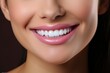 © Marcela Ruty Romero - Close up of a woman's smile with perfect white teeth.