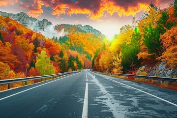 Wall Mural - Road landscape in mountains with colorful trees in autumn season. Highway scenery in autumn landscape at sunset with beautiful colors. Nature landscape on forest in stunning fall.