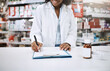 © AK Coop/peopleimages.com - Pharmacy, healthcare and hands with medicine, clipboard and writing for safety of pills and info. Shop, pharmacist woman and checklist of label, product and process of prescription and person