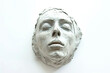 © LipskiyS - Plaster sculpture of a woman on a white background