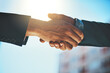 © Penn/peopleimages.com - Business people, city and handshake for real estate deal, property investment and b2b partnership agreement. Clients, realtor or investor shaking hands for thank you, success and outdoor introduction