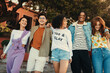 © Jacob Lund - Group of friends enjoying summer day in the city, laughing and walking together