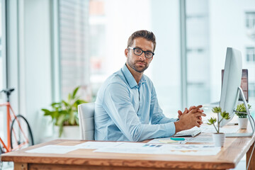 Canvas Print - Vision, portrait and man in office, computer and market research for social media manager, online and reading. Glasses, digital and working for agency, ideas and goal of project in morning and desk