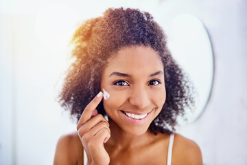 Poster - Black woman, portrait and skincare cream in bathroom for wellness routine with natural beauty, skin and glow. Happy, face and facial lotion in home with dermatology, smile and self care in morning