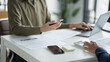 © Wanda - Corporate Collaboration Two Entrepreneurs Engaged in a Productive Business Meeting