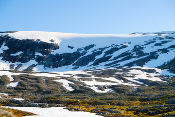 Wall Mural - nature in norway. panoramic view of wild norway. rocks and mountains. bright sunshine in the daytime