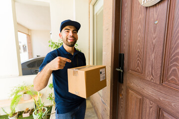 Security camera captures delivery man smiling and pointing at package