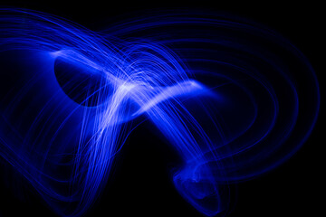 Canvas Print - blue lines of light in the dark