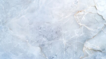 Wall Mural - A white marble wall with a few cracks and a few spots