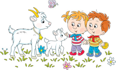 Wall Mural - Little boy and girl treating a cute small goatling with a tasty cookie in a flower field on a summer vacation, vector cartoon illustration isolated on a white background