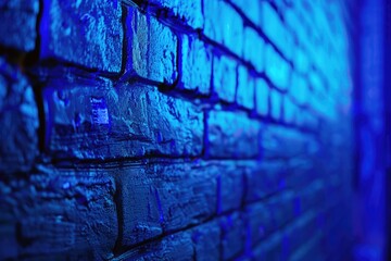 Poster - A brick wall with a single blue light shining on it, providing a sense of ambiance and moodiness