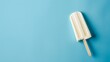 © drdigitaldesign - Ivory Popsicle on a summery blue Background with Copy Space