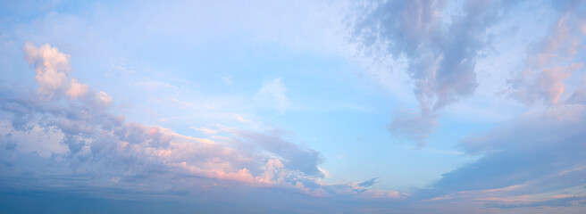 Aufkleber - A clear blue sky with a few clouds. The sky is very bright and the clouds are scattered throughout