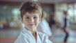 © Viktoriia - Young Boy in White Uniform Smiles During a Martial Arts Class. Generative AI