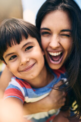 Poster - Smile, selfie and portrait of kid with mother laughing, bonding and happy memory together outdoor. Face, child and funny mom with profile picture for social media, support and wink for love of family