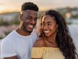 © pisan - Happy Couple Sharing a Romantic Moment on a Rooftop Terrace with Stunning City Views, Perfect for Engagement, Love, and Relationship Photography
