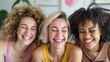 © JR-50 - Three diverse women laughing together in a close-up shot, showcasing genuine happiness and friendship.