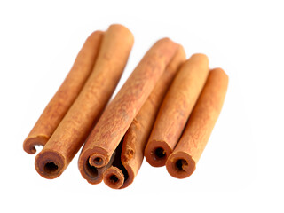 Sticker - cinnamon sticks on a white background