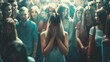 © NiK0StudeO - A woman is crying in front of a crowd of people