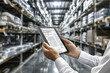 © fanjianhua - In the warehouse, holding a tablet in hand