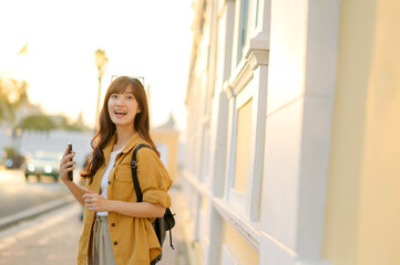 Wall Mural - Traveler asian woman 30s enjoying travel in Bangkok, Thailand. Journey trip lifestyle, world travel explorer or Asia summer tourism concept.