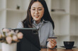 © ARMMY PICCA - Happy asian woman using smartphone shopping online with credit card. Lifestyle. Easy pay using smart phone or digital device.