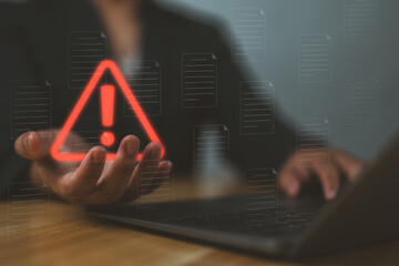 Poster - internet network security concept, man working on computer with triangle warning sign developer with triangle caution warning sign for notification error and maintenance, e-document data protection