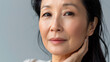 © Rabil - Middle-aged Asian woman with natural makeup shows off her beautiful skin. She takes care of her skin and uses products to keep it looking young and healthy.