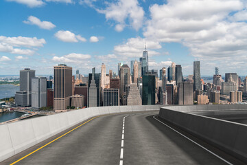 Wall Mural - Empty urban asphalt road exterior with city buildings background. New modern highway concrete construction. Concept of way to success. Transportation logistic industry fast delivery. New York. USA.