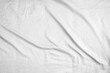 © Kwangmoozaa - Abstract white wrinkled bedding sheet fabric texture background