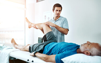 Poster - Senior man, knee injury and physiotherapist working in consulting room, rehabilitation with exercise. Male people, office and together for physiotherapy service with health insurance or support