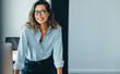 © Jacob Lund - Happy business woman looking at the camera, expressing confidence in her professional capabilities