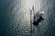 © Westend61 - Aerial view of wind turbine installation vessel at offshore wind farm in North Sea on sunny day