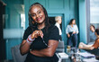 © Jacob Lund - Business meeting with the team: Mature woman looking at the camera in a boardroom