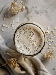 Wall Mural - A glass of oatmeal sits on a table, ready to be enjoyed