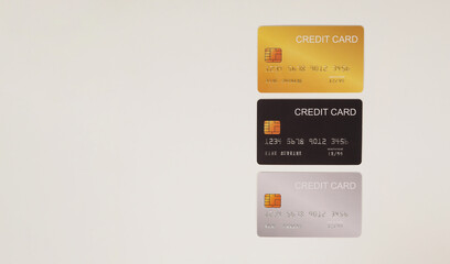 Wall Mural - Three credit cards on white background.