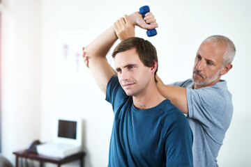 Wall Mural - Patient, physiotherapist and weight for arm in clinic, physiotherapy and dumbbell or sport injury recovery. Body wellness, mobility support and man for muscle strength, help and healthcare assessment