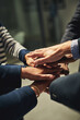 © peopleimages.com - Hands, together and diversity in office with teamwork for business, inclusion or commitment for job. Group, people and fingers in huddle with support for team building, staff with solidarity or goals