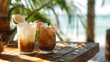 © Emma - Coconut drink and ice coffee on the wooden table