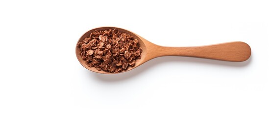 Aufkleber - A wooden spoon holds chocolate granola cereal with nuts, displayed against a white background, creating a clean scene with copy space image.
