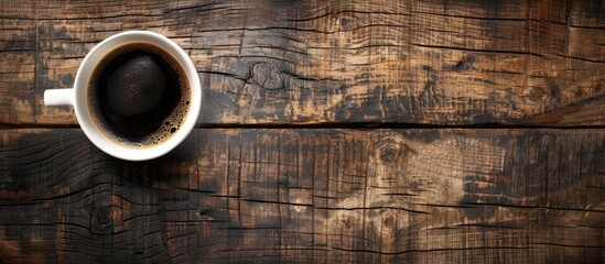 Aufkleber - Wooden table with black coffee providing a textured abstract background and room for text in a copy space image.