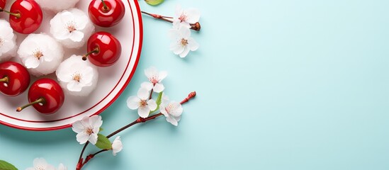 Poster - Colorful background enhances the appeal of delicious cherry dumplings in the image with copy space.