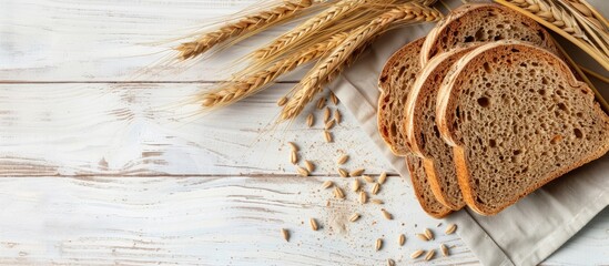 Poster - Health and diet concept showcased with rye bread slices and wheat ears on a light wooden background, perfect for copy space image.