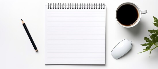 Poster - Top view of a white office desk featuring a blank notebook, computer, supplies, and a coffee cup, suitable for adding text or images