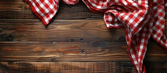 Aufkleber - Wooden table topped with a red checkered napkin or tablecloth, offering copy space for your personal touch.