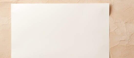 Aufkleber - Overhead view of a blank white paper on a beige background with copy space image.
