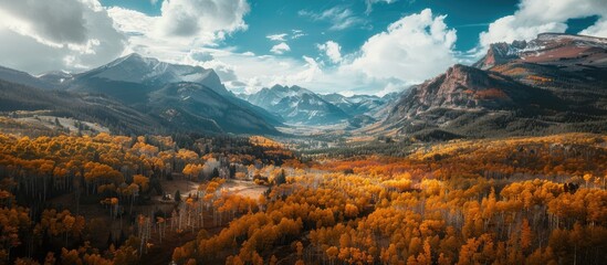 Poster - Aerial perspective of sunny fall mountains, capturing a scenic landscape with ample copy space image.